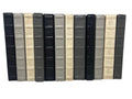 4 Vol. Assorted Leather Bound Books in Dark and Neutral Colors