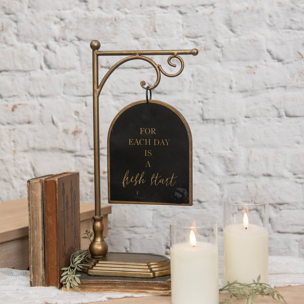 BLACK & GOLD HANGING SIGN ON STAND
